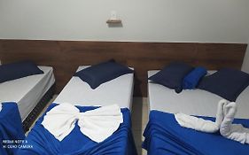 Pousada Quarto com frigobar,ar e garagem gratuita